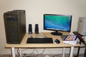 Mavericks installed on CustoMac. NB: MBPr on desk and PowerMacintosh 8500/120 on right.