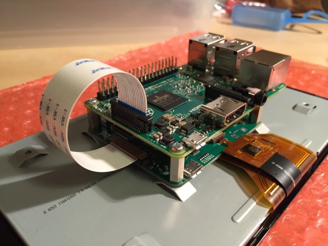 Connect the other end of the display cable into the output connector on the Raspberry Pi.