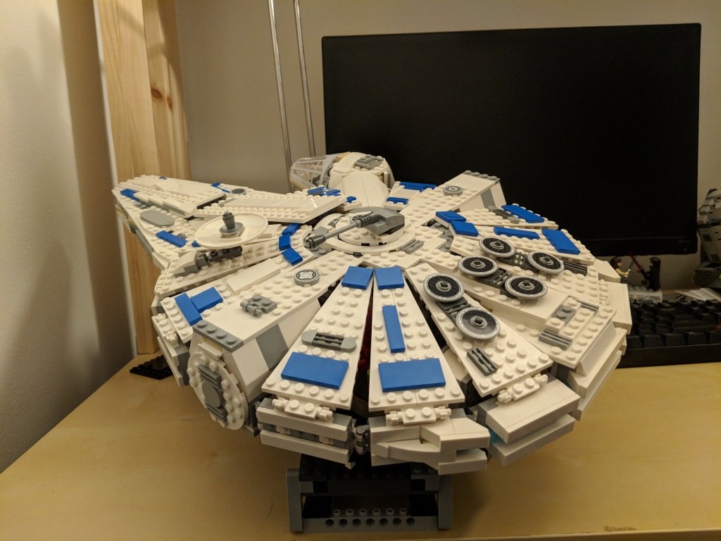 LEGO Kessel Run Millennium Falcon on display stand.