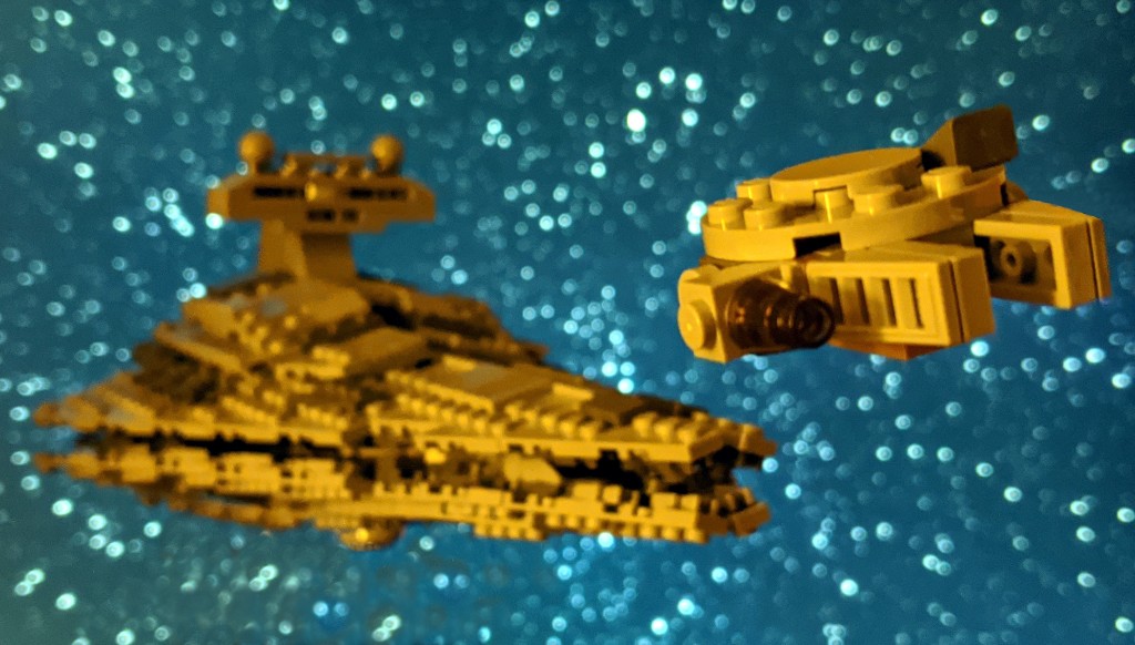 LEGO Millennium Falcon is fleeing a pursuing Midi-Scale Imperial Star Destroyer