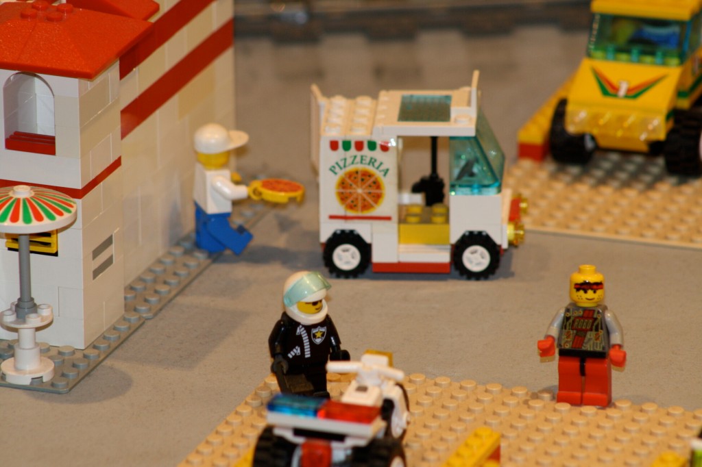 Brick City in Niagara Falls, LEGO sets, custom models, and minifigures on display.