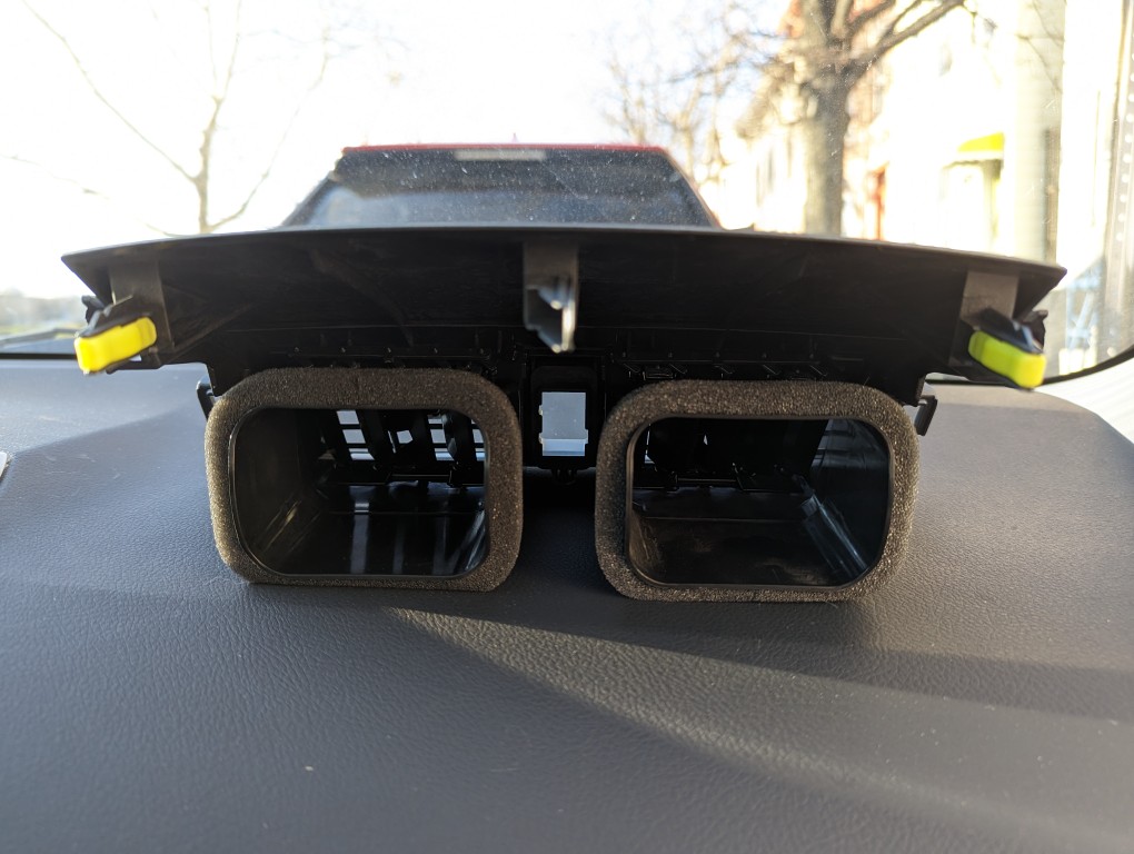 Replacement 2013 Toyota Corolla center console air vent assembly.