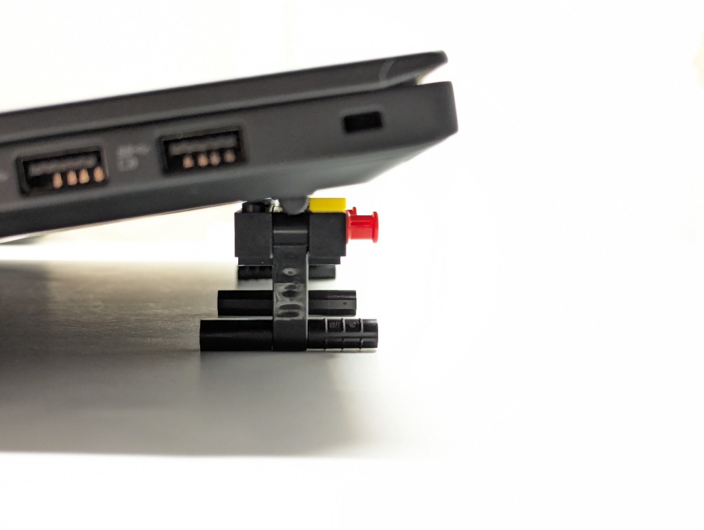 LEGO Folding Cooling Stand for Lenovo ThinkPad P1 Gen 4 Laptop holding up the laptop, side view.